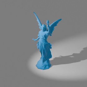 Angel statue lit by a focused spot light